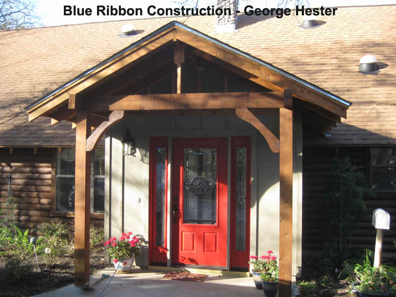 Log Cabin Covered Entry for Blue Ribbon Construction and Consulting by George Hester